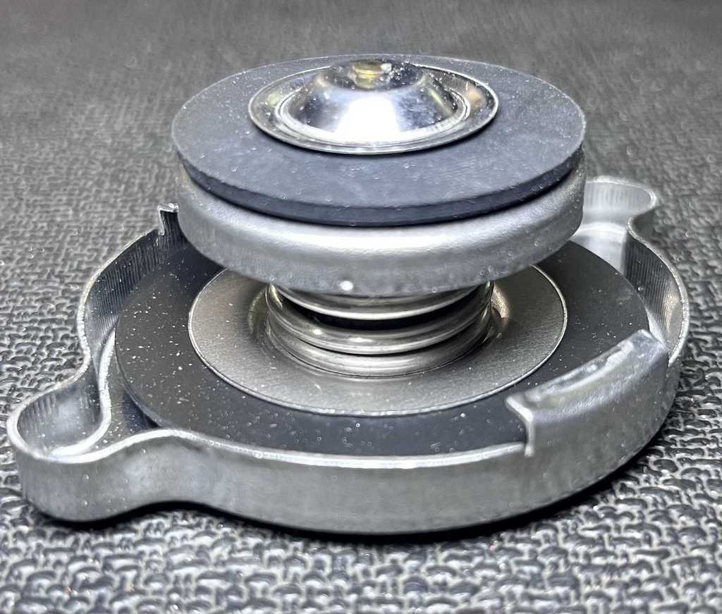 [AE-09-31525] Tapa de Radiador / 18 lbs