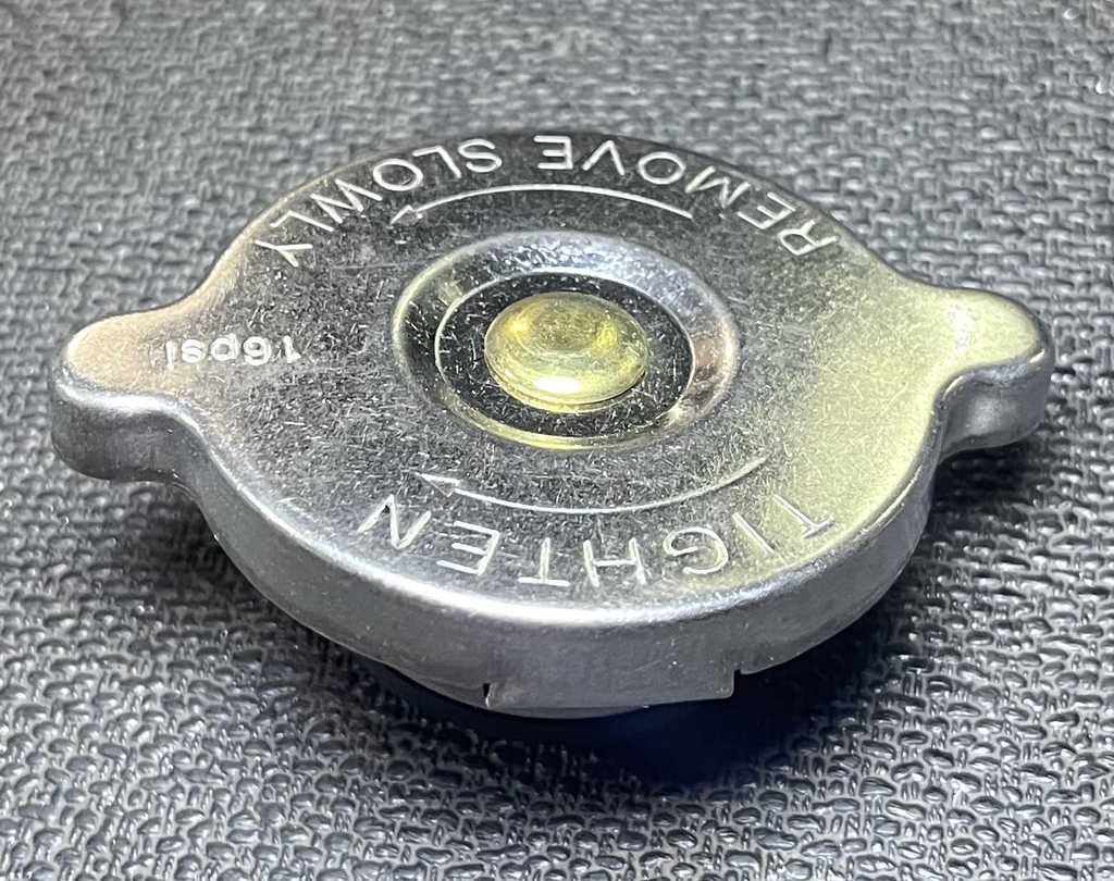 [AE-09-31528] Tapa de Radiador / 16 lbs